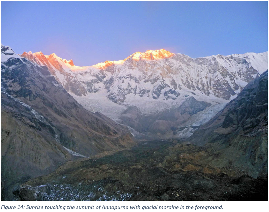 Figure 14: Sunrise touching the summit of Annapurna with glacial moraine in the foreground.