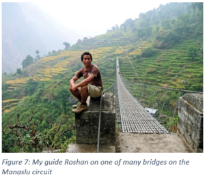 Figure 7: My guide Roshan on one of many bridges on the Manaslu circuit